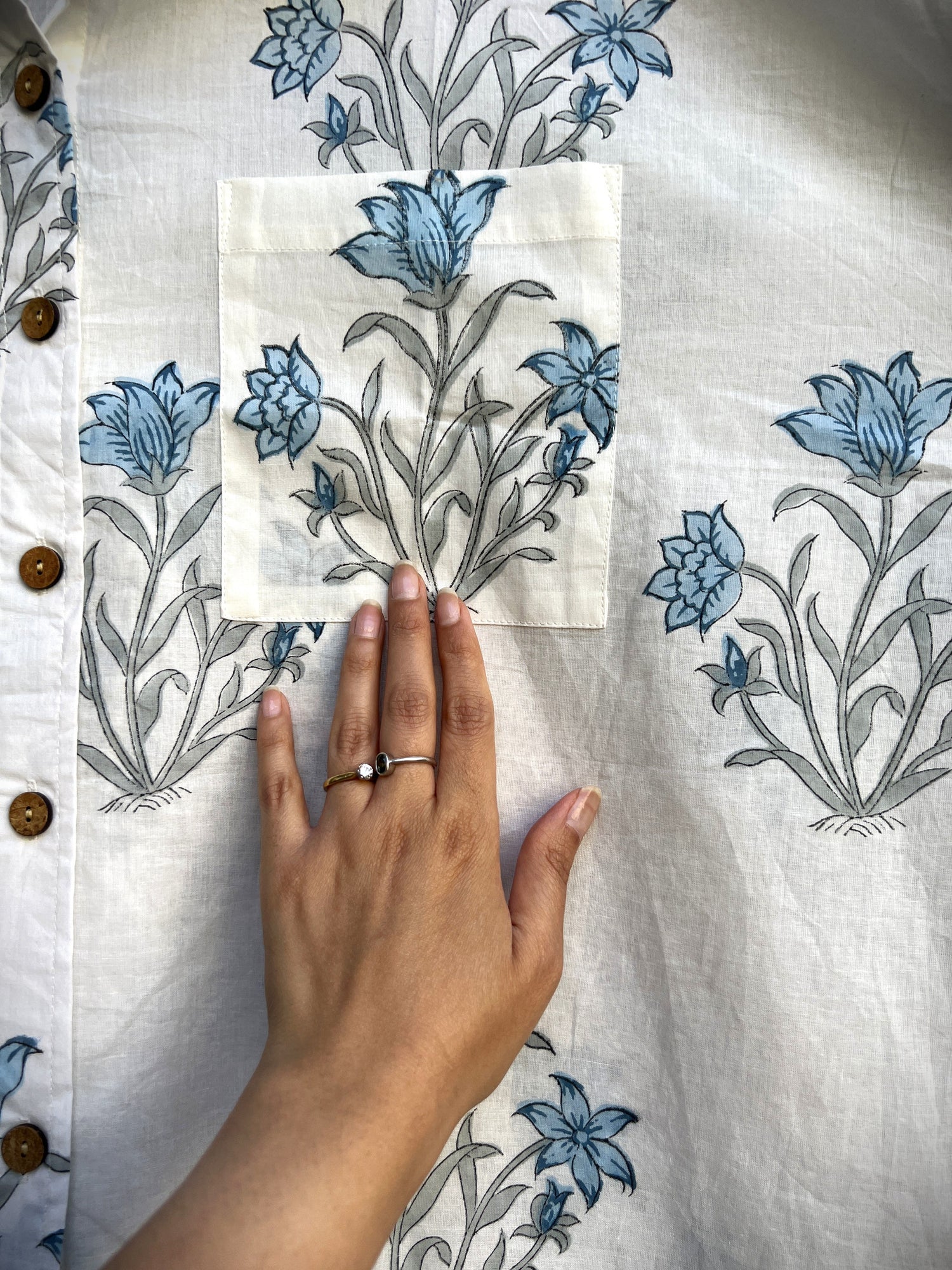 A botanical motif inspired by Mughal garden on a ivory fabric.