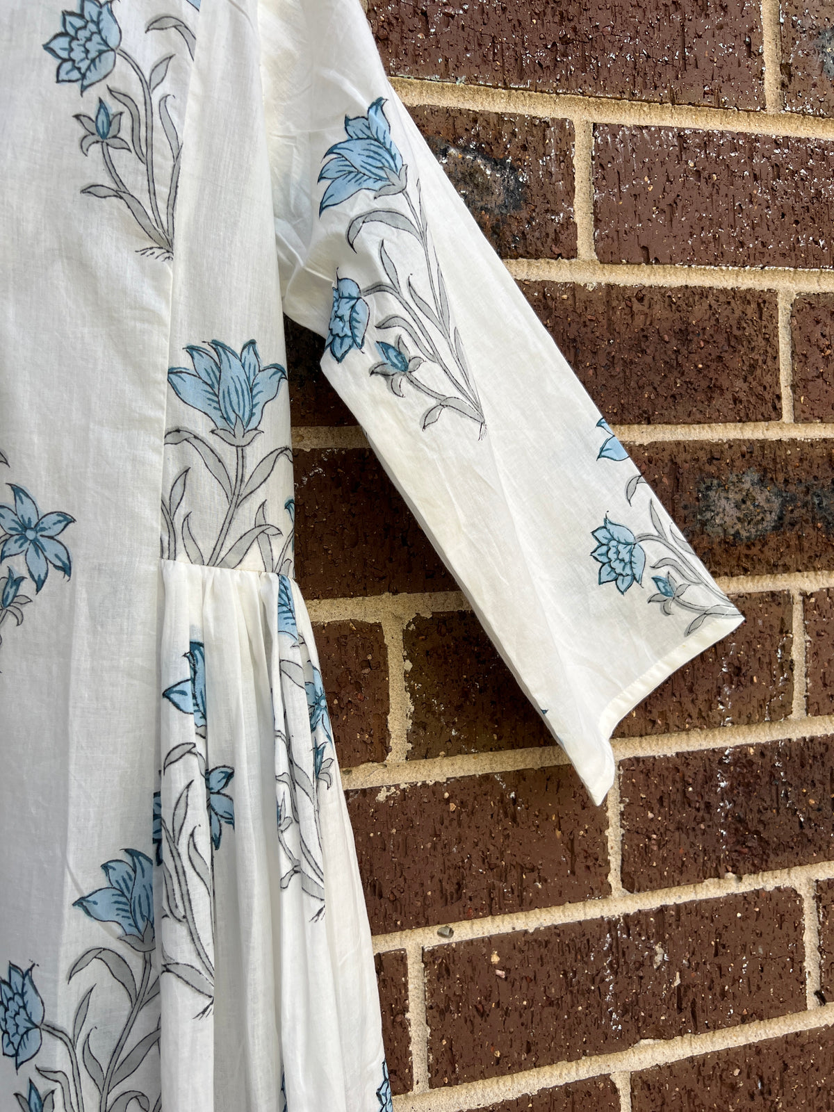 Close up of a Ivory kurti dress with hand block motifs