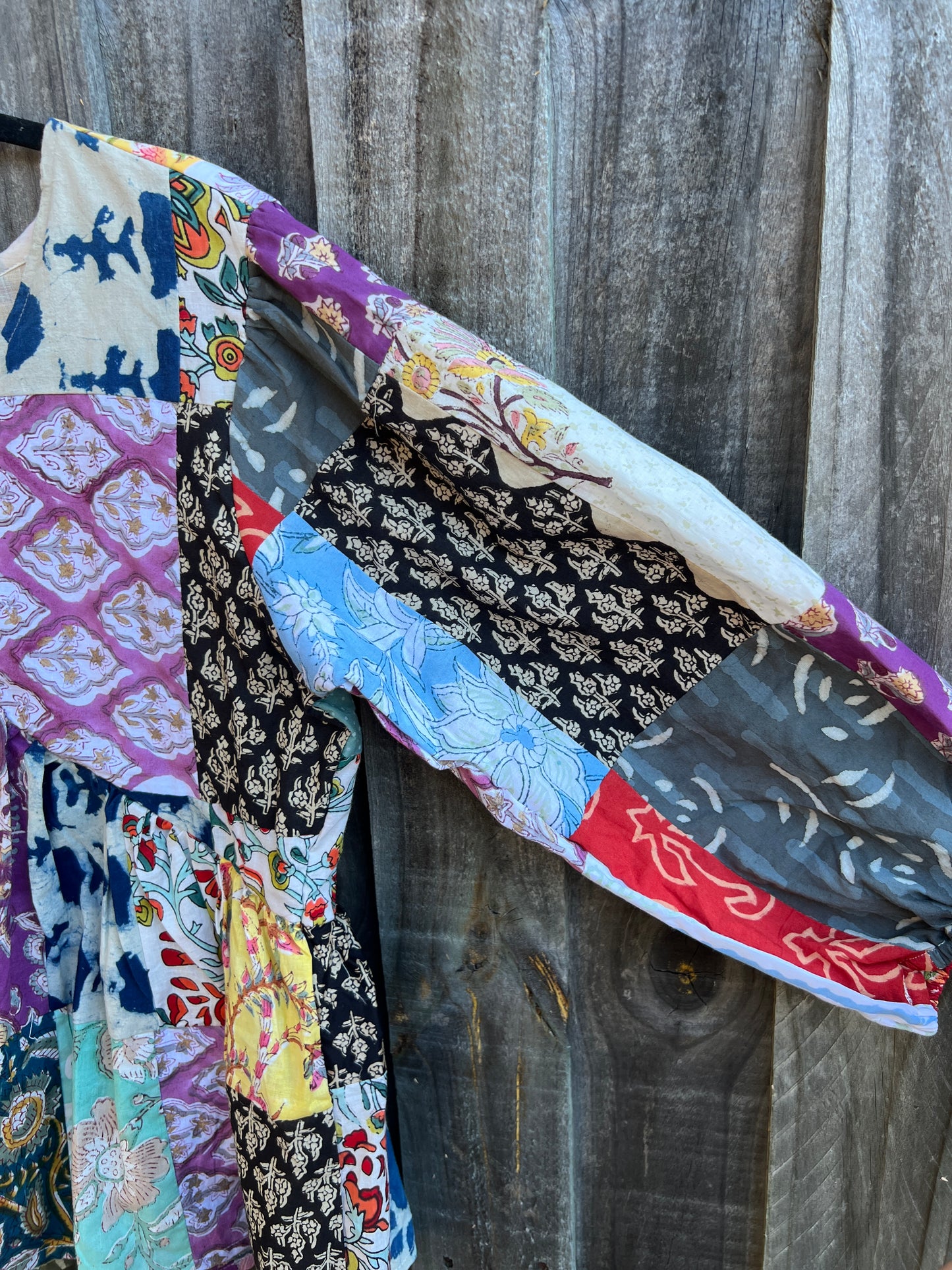 Patchwork top sleeves close up